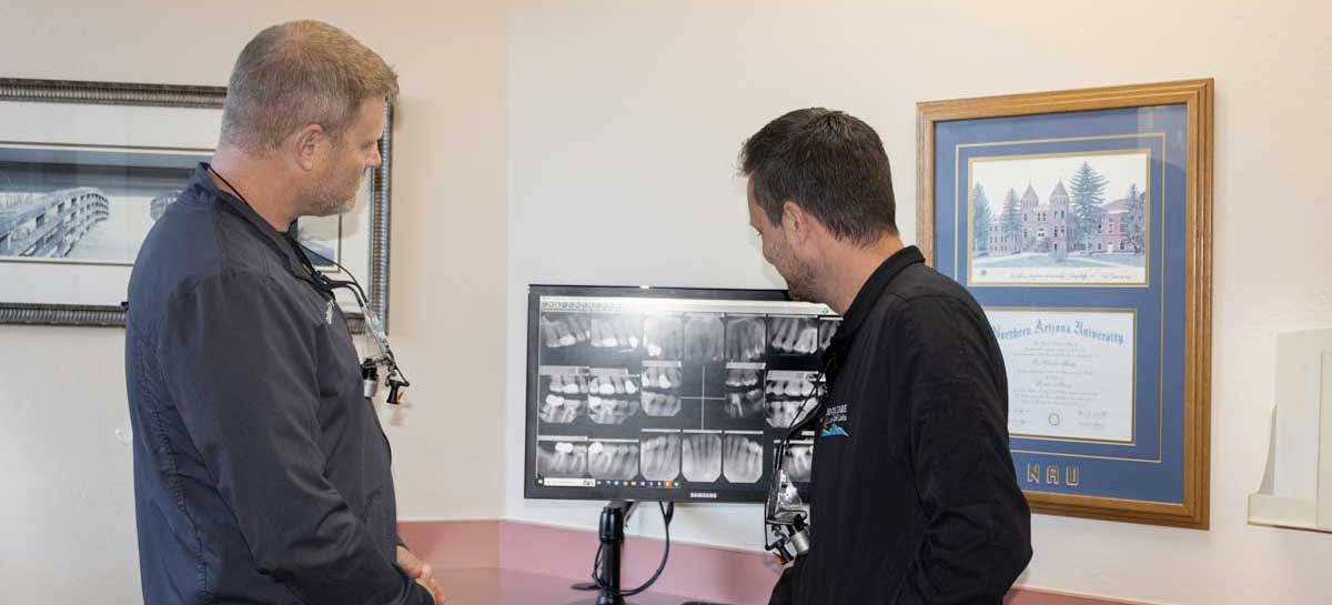 Dr. Hardy and Dr Kahl Evaluate a Mouth Before Implants and Cosmetic Dentistry